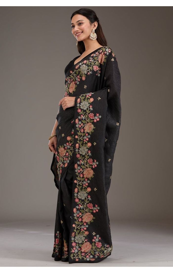  Front view of black silk saree with designer blouse