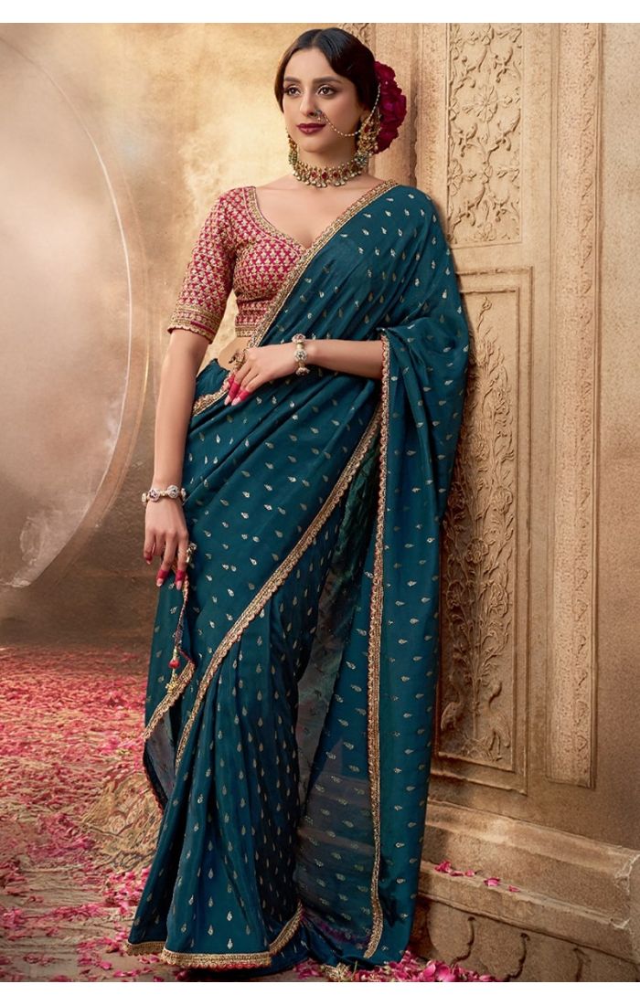 Front view of Bottle Blue viscose crepe saree with zari embroidery