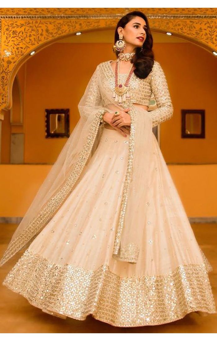 Cream Lehenga Choli with Zari Work for Bridal and Festive Wear