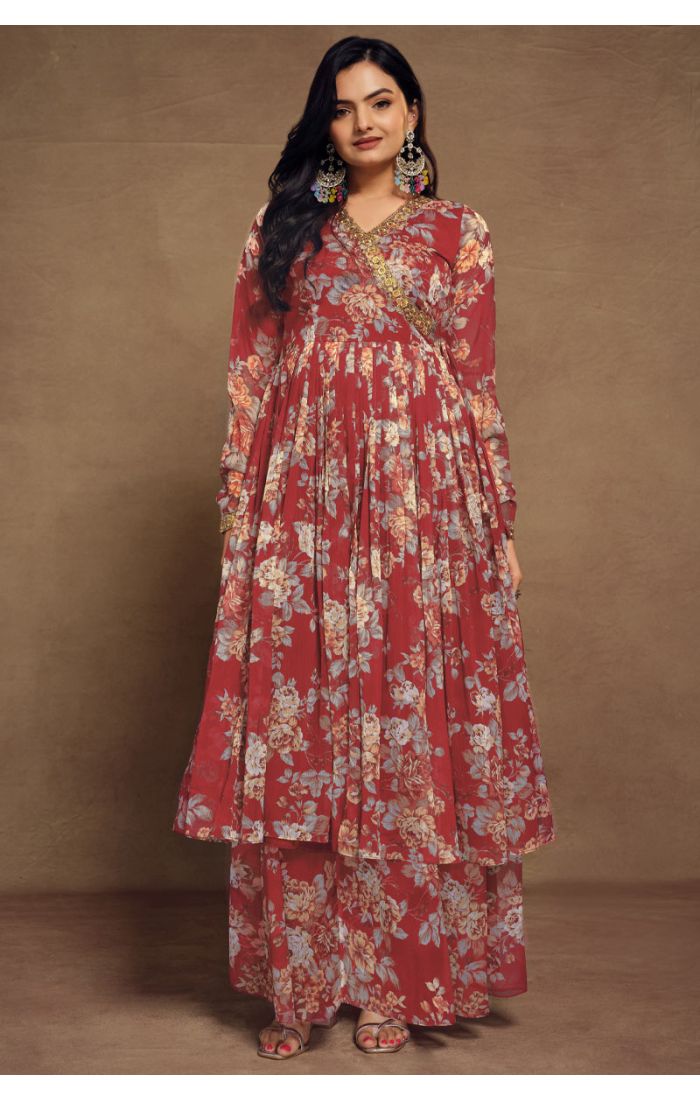 Maroon floral georgette salwar suit with V-neck and golden lace detailing, paired with palazzo pants and dupatta.