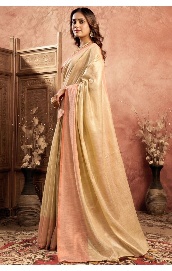 Side angle showcasing saree pallu fall and movement