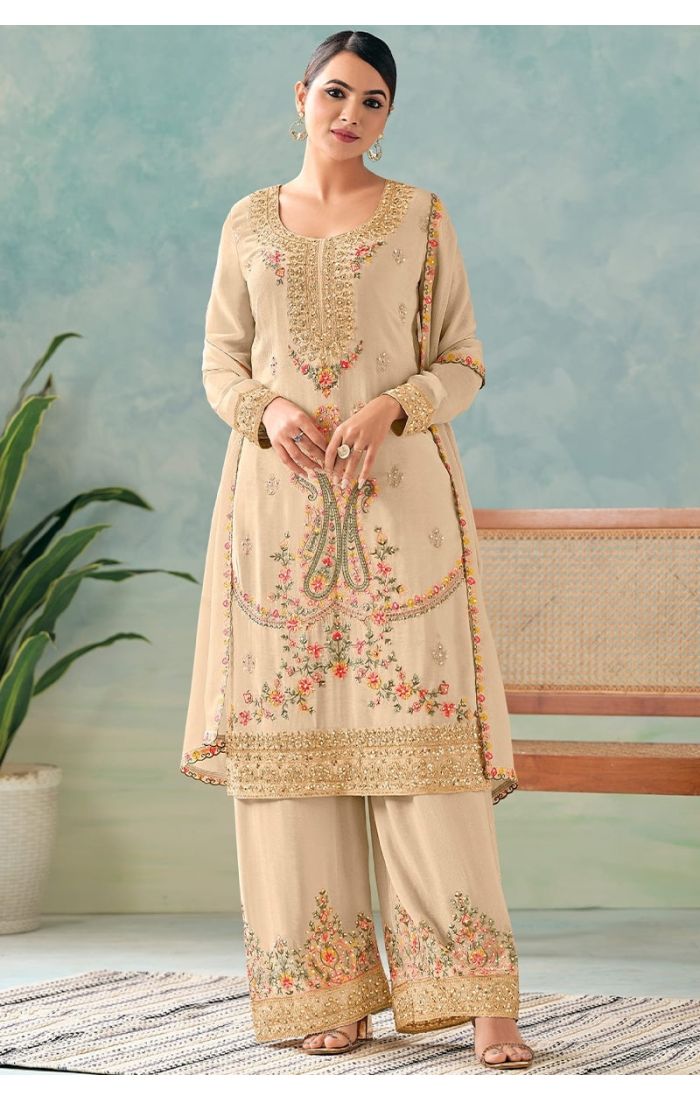 Full front view of cream chinon salwar suit with embroidery and sequins work.