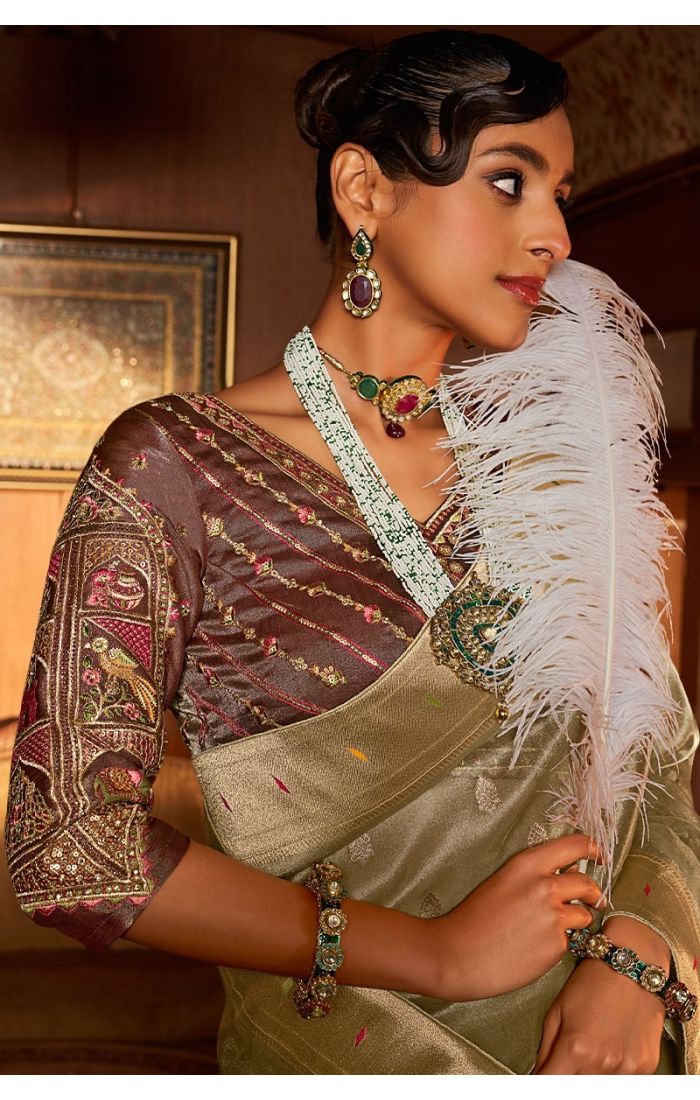 Close-up of resham embroidery and weaving print on tissue silk