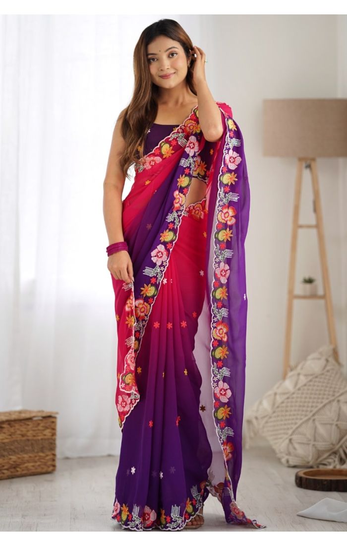Woman wearing ombre magenta-purple georgette saree with floral embroidery and contrast blouse – festive ethnic outfit