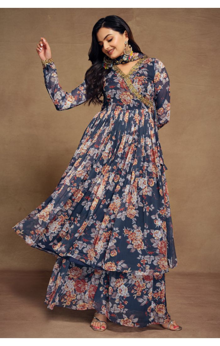 Side angle showing intricate golden lace work on the V-neck floral printed outfit.