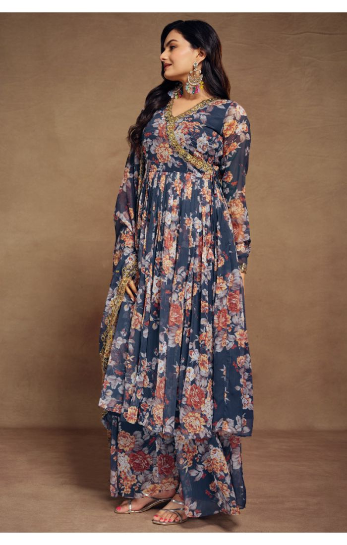 Back and side view of blue georgette floral kurta and palazzo with flowing dupatta.