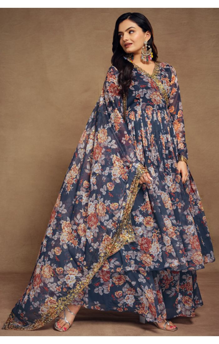 Front pose of the blue floral georgette ethnic outfit with golden lace detailing.