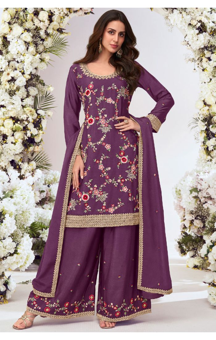 Purple georgette embroidered palazzo suit with scoop neck and lace border.