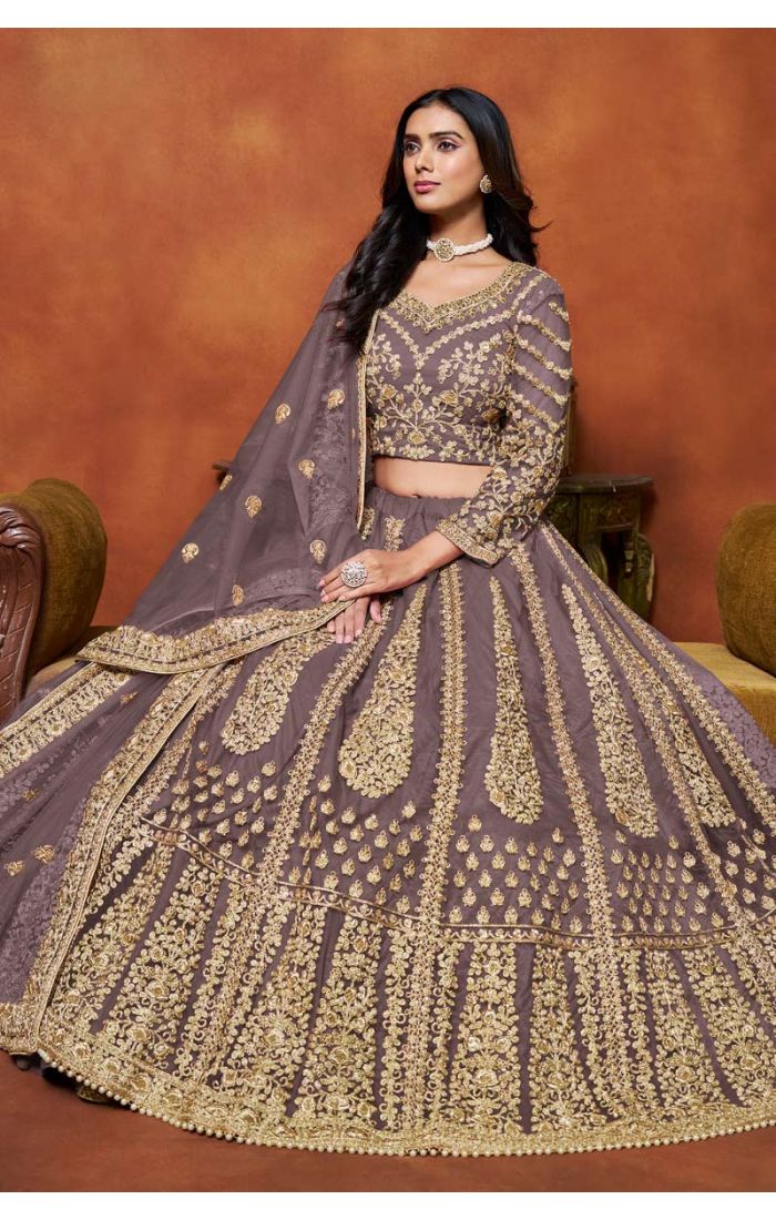 Mauve Embroidered Net Lehenga with Golden Detailing - Perfect for Weddings and Festive Occasions