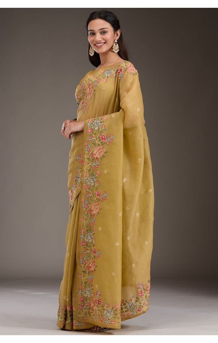 Full front view of gold silk saree with satin blouse