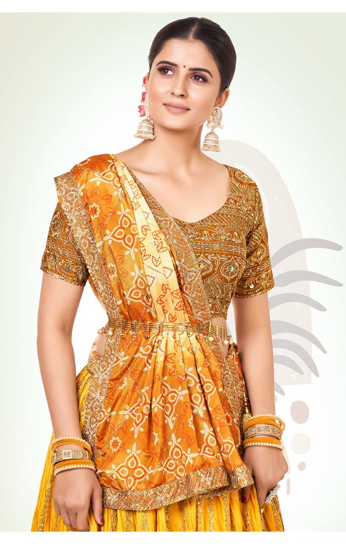 Golden Bandhani Silk Navaratri Lehenga Choli with zari embroidery and Bandhani dupatta