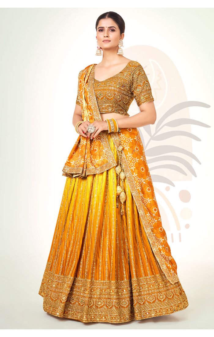 Golden Bandhani Silk Navaratri Lehenga Choli with V-neck and short sleeves – front view