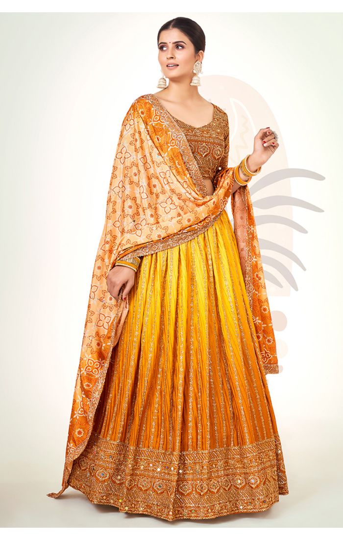 Golden Bandhani Silk Navaratri Lehenga Choli with V-neck and short sleeves – front view