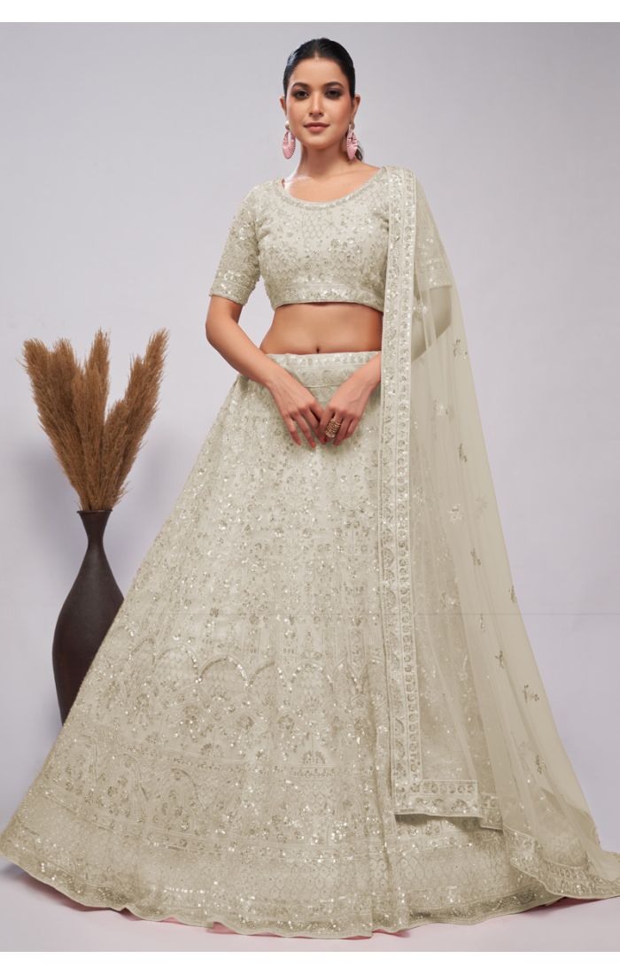 Graceful Ivory Sequins Embroidered Net Lehenga Choli for Weddings and Parties