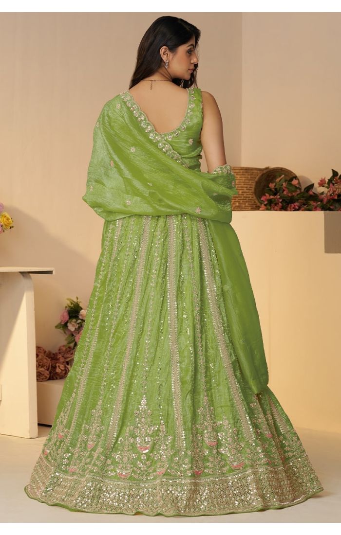 Back view of green sequin and cut dana lehenga with net dupatta – perfect for Mehendi brides