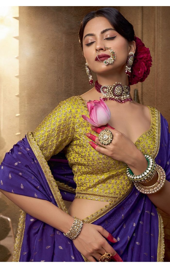 Embroidery close-up of zari and resham work on light purple saree