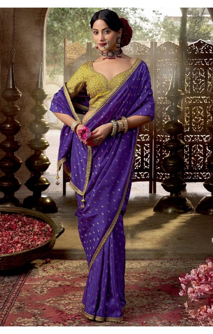 Full display of lavender viscose crepe saree with lace and zari detailing