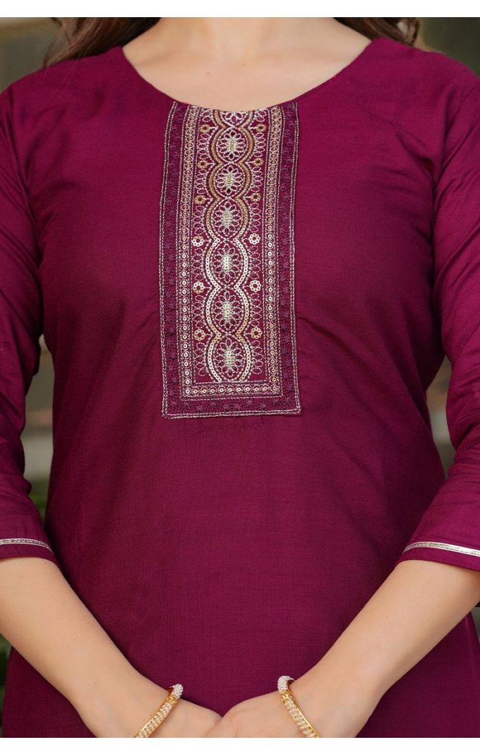 Maroon embroidered cotton kurta pant set with printed dupatta for festive and wedding occasions.