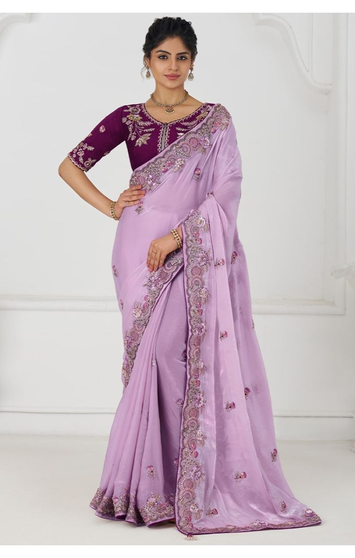 Full frontal pose showcasing mauve embroidered saree in luxurious Fendi fabric for wedding occasions.