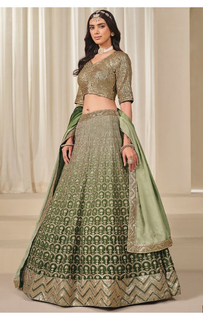 Full view of green mehendi chinon silk lehenga with dupatta displayed on mannequin