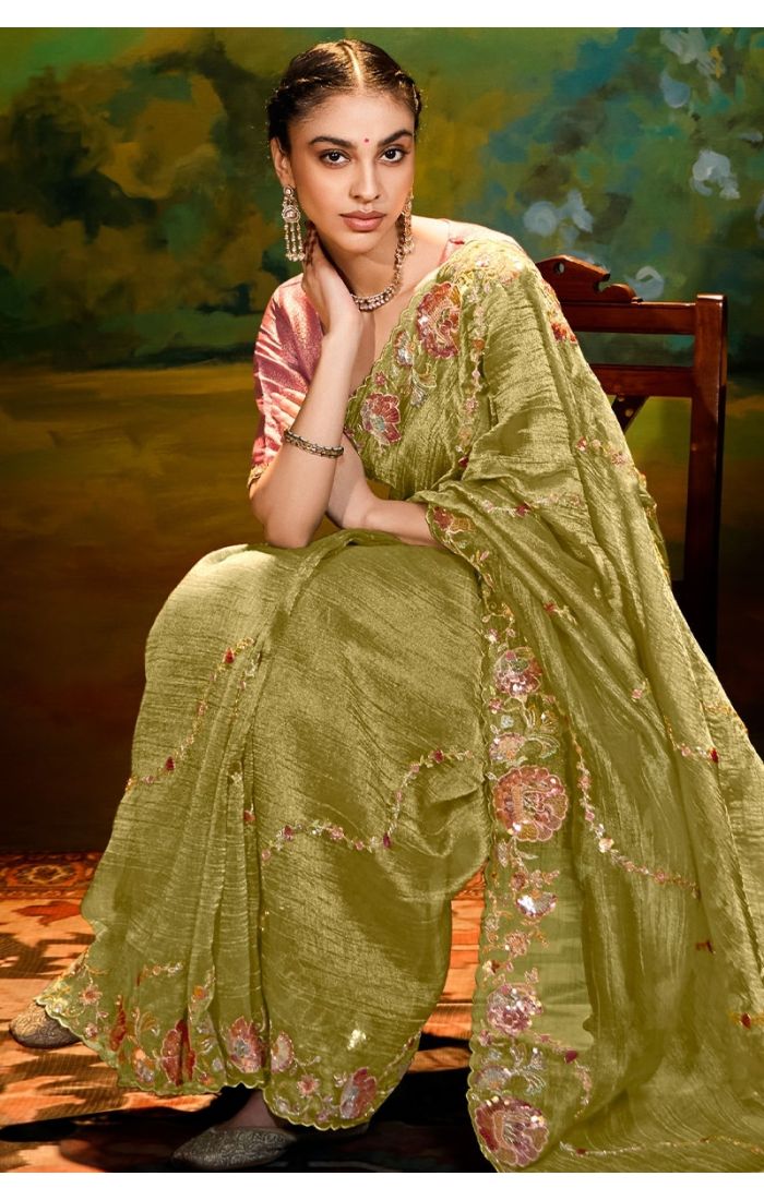  Side drape of parrot green organza saree with raw silk un-stitched blouse