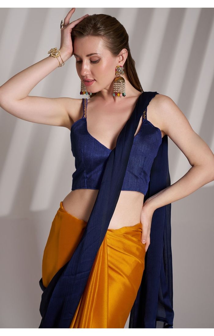 Golden yellow chiffon saree with navy blue art silk blouse – Elegant wedding and festive wear