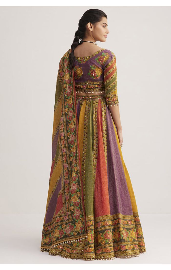 Full view of multi-color silk Navaratri lehenga choli set with printed floral design, V neck blouse and matching dupatta for festive and party wear