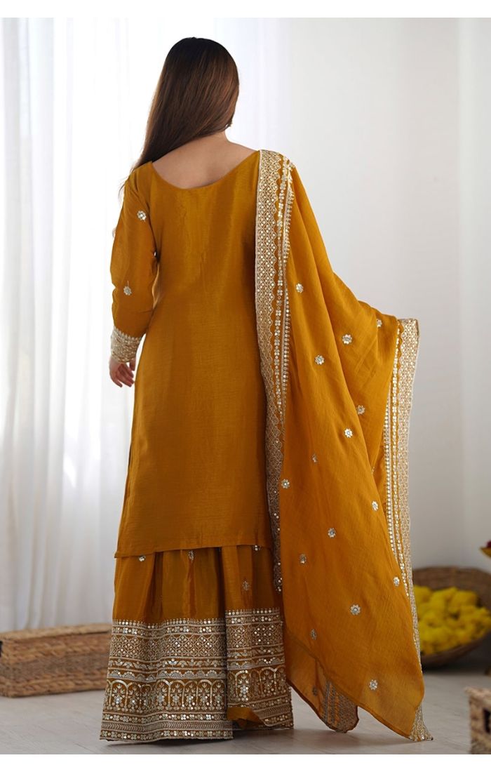 Mustard Chinon Silk Sharara Suit with handcrafted mirror, zari, and sequins embroidery – perfect for Eid, wedding, and festive occasions