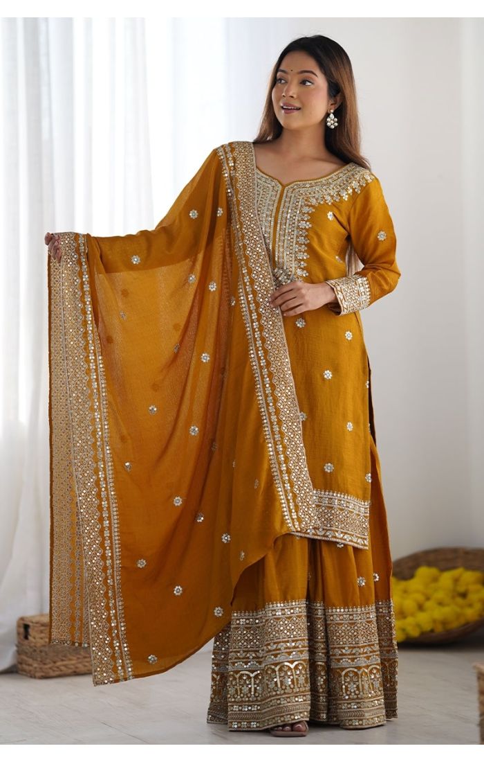 Mustard Chinon Silk Sharara Suit with handcrafted mirror, zari, and sequins embroidery – perfect for Eid, wedding, and festive occasions