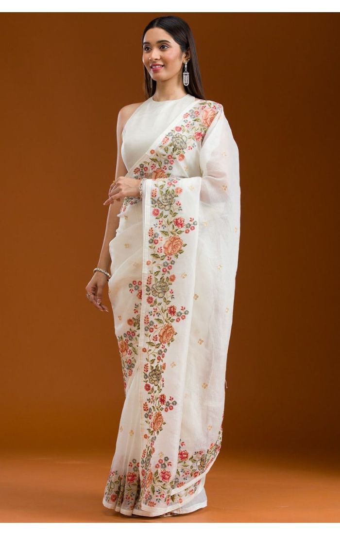 Front view of off-white silk saree with embroidered blouse