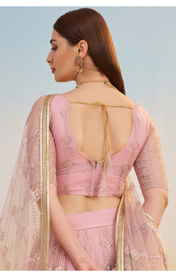 Bottom flare and border design of pink embroidered net lehenga with zari and sequin work, modern festive wear from Appelle Fashion.
