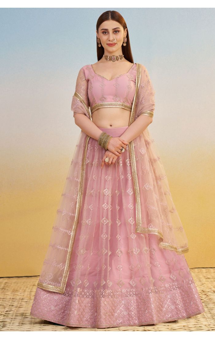Party wear pink embroidered net lehenga with sequins and zari — full front view, elegant bridal or bridesmaid look, Appelle Fashion.