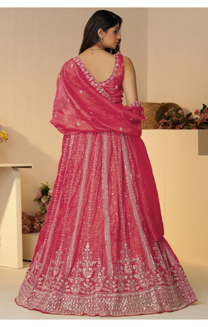 Pink silk lehenga back view with heavy paisley embroidery and net dupatta – bridal Indian outfit USA