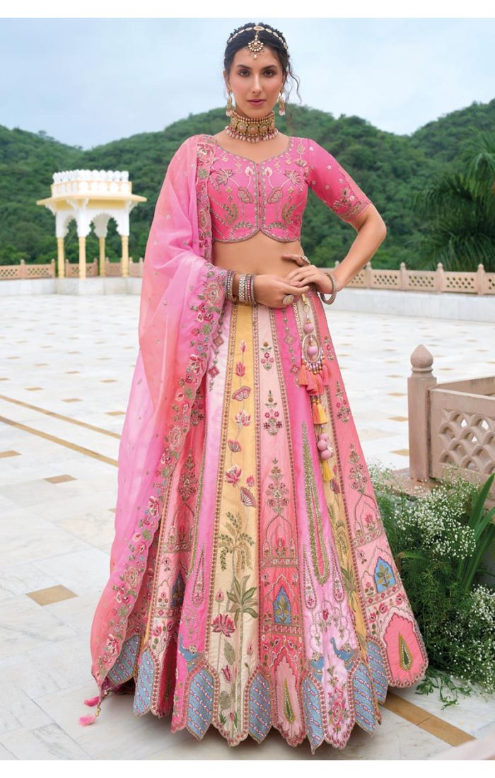 Pink silk lehenga choli with zari and sequin embroidery, floral motifs, and an embroidered dupatta – perfect for weddings and festive occasions.