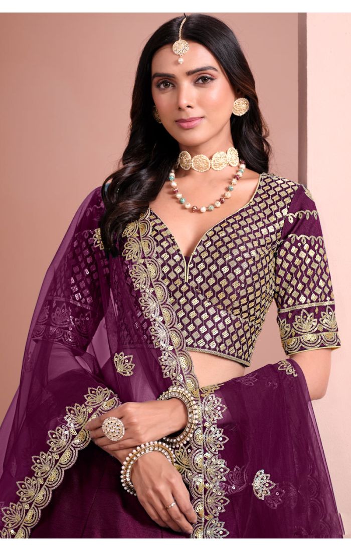 Close-up of plum designer blouse with golden embroidery — Appelle Fashion