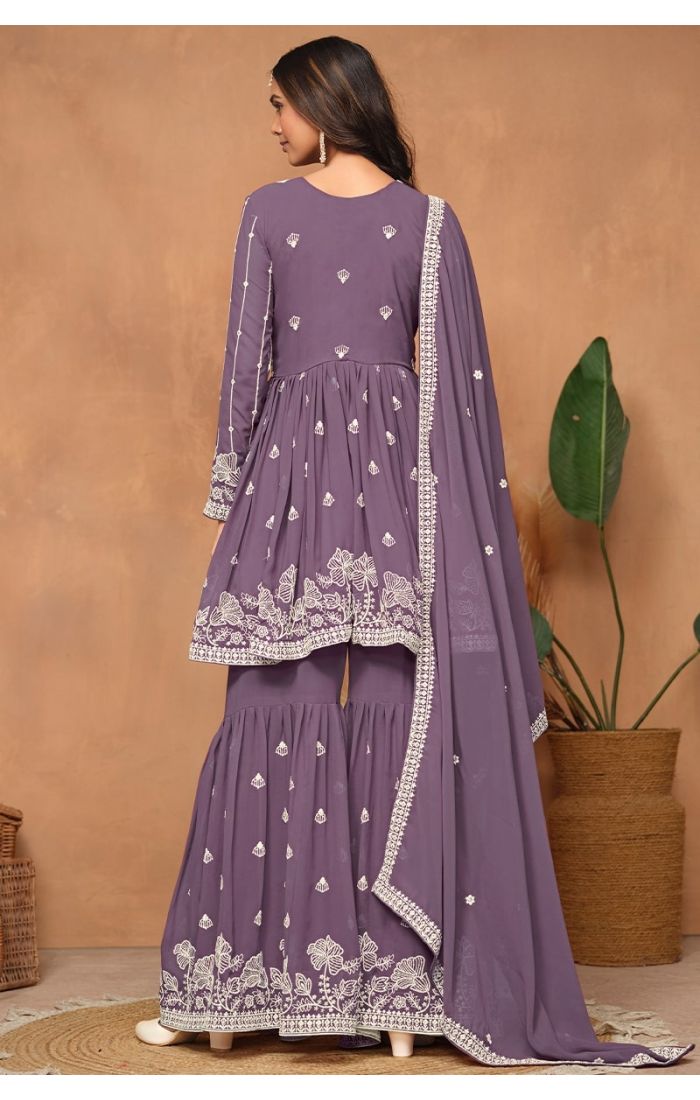 Detailed back view of sharara pants highlighting thread and sequin embellishments.