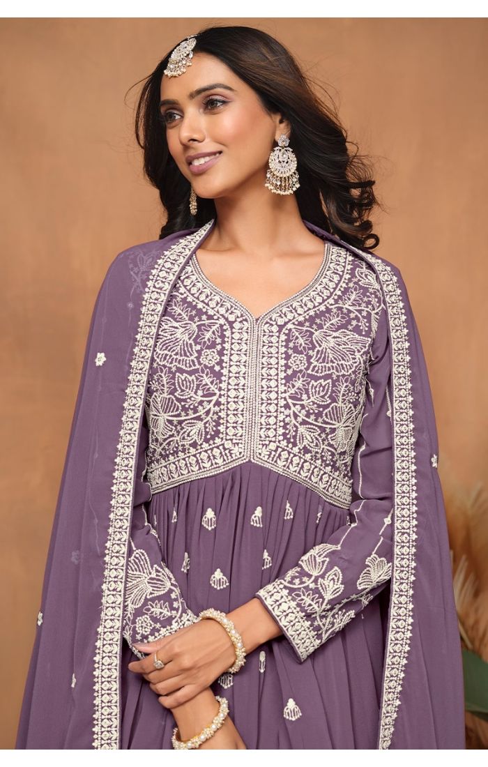 Close-up of neckline and yoke embroidery on purple sharara suit.