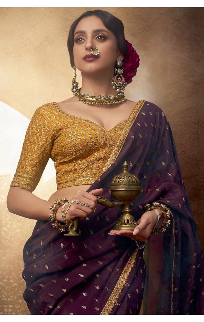  Close-up of zari and resham embroidery with lace border