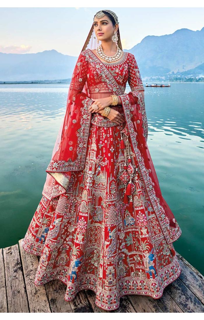 Red Bridal Lehenga with Handcrafted Zardosi Embroidery featuring intricate designs and luxurious craftsmanship, perfect for weddings and traditional celebrations.