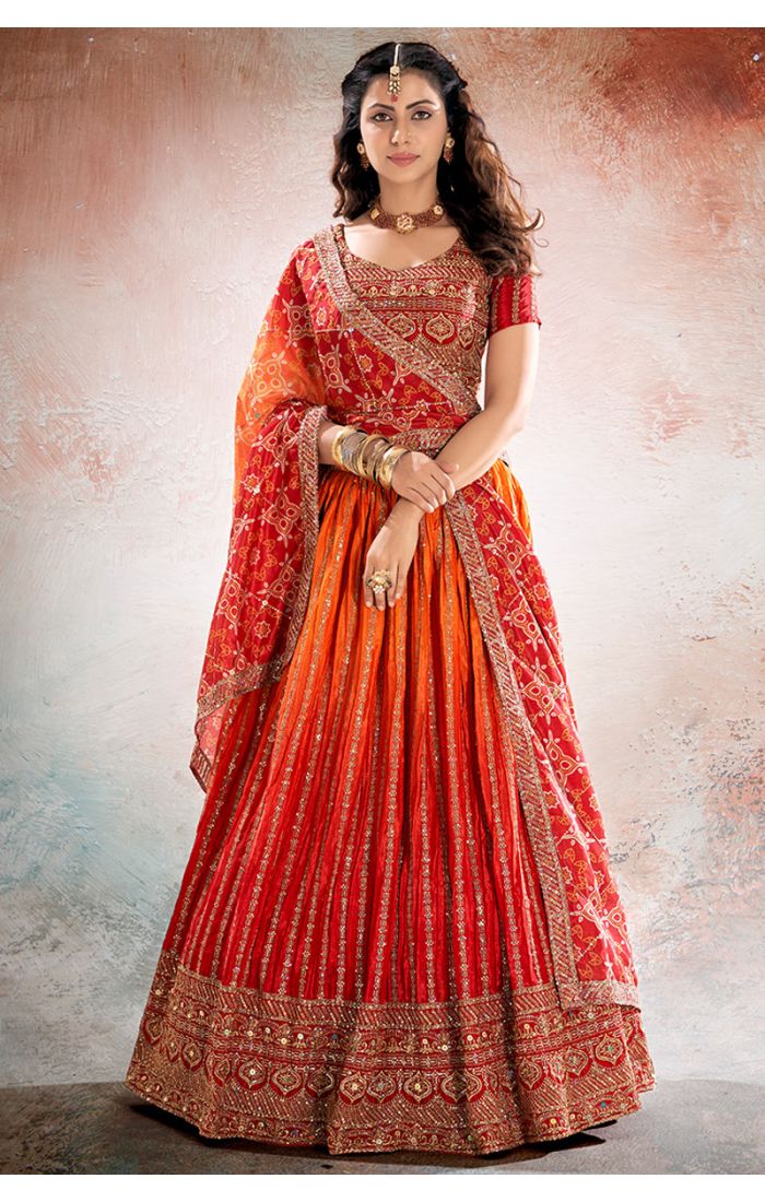 Side view of Red-Orange Silk Navratri Lehenga with embroidered dupatta – LEHV4137