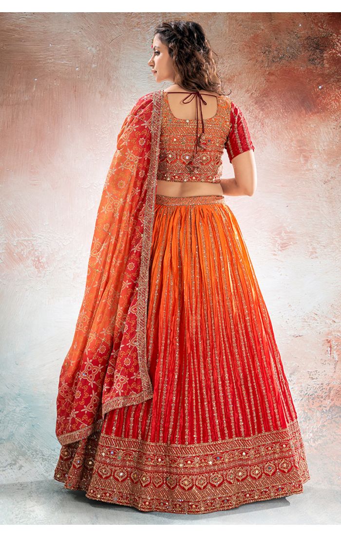 Back view of Red-Orange Navratri Lehenga showcasing embroidery details – LEHV4137