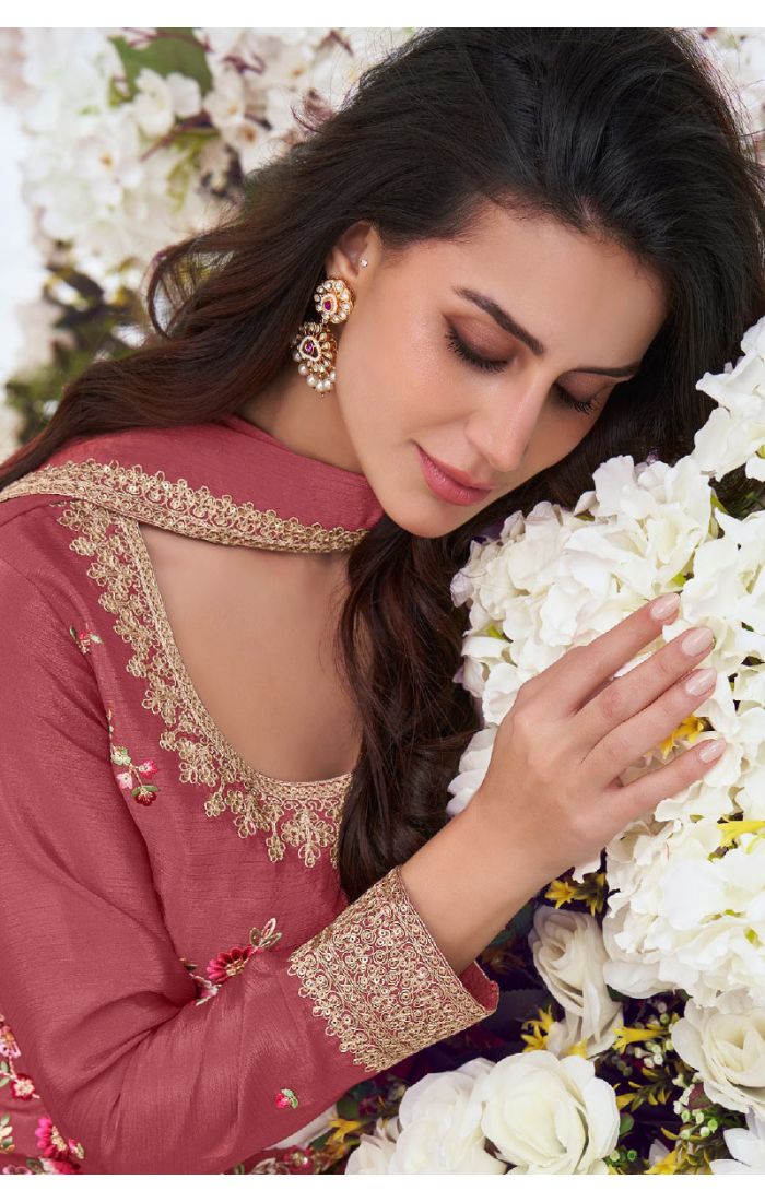 Rose pink soft silk suit set with floral embroidery, round neck design, matching palazzo pants, and embroidered dupatta – ideal for weddings and festive occasions.