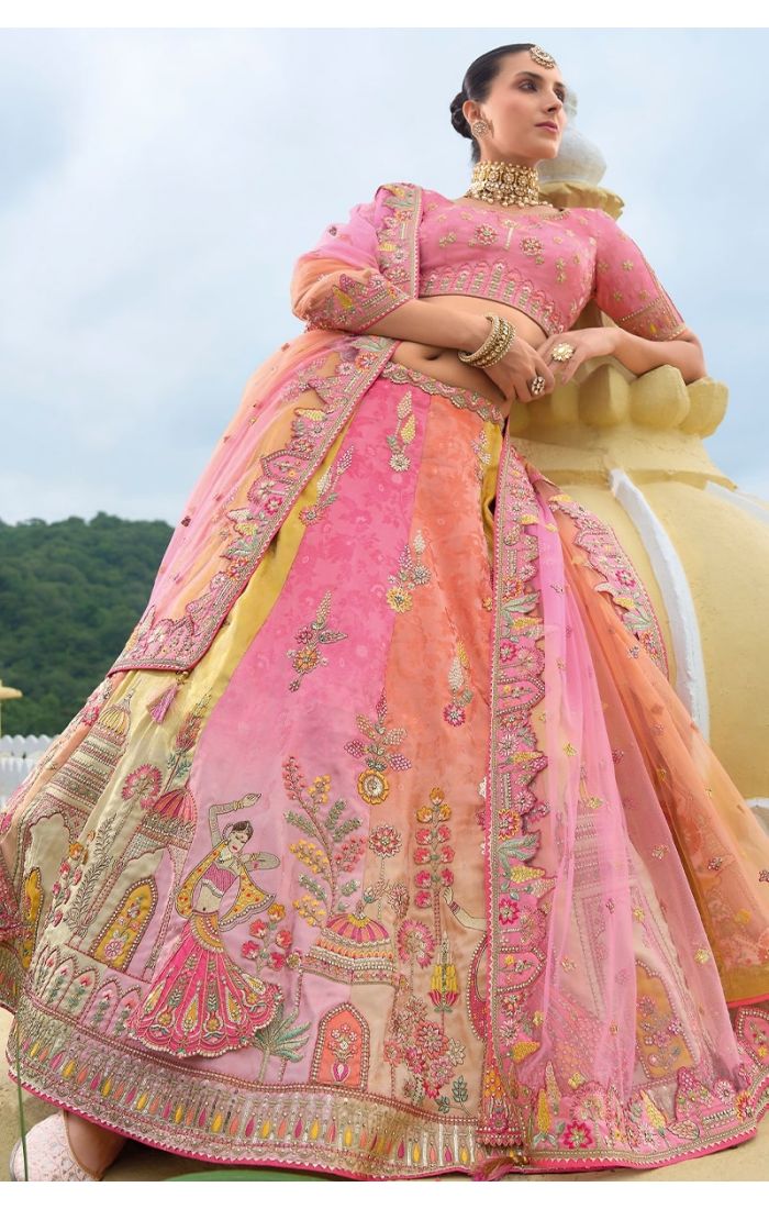 Royal Sunset Banarasi Lehenga – Traditional Indian Wedding Wear in Peach, Pink & Gold with Handcrafted Embroidery