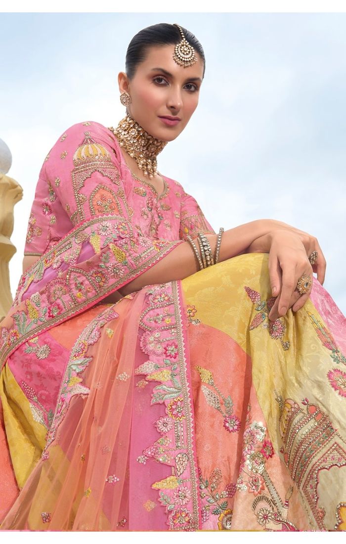 Royal Sunset Banarasi Lehenga – Traditional Indian Wedding Wear in Peach, Pink & Gold with Handcrafted Embroidery