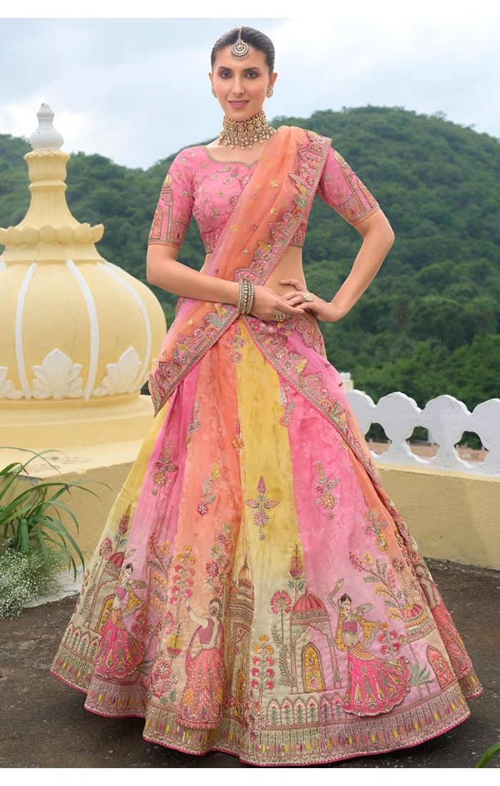 Royal Sunset Banarasi Lehenga – Traditional Indian Wedding Wear in Peach, Pink & Gold with Handcrafted Embroidery