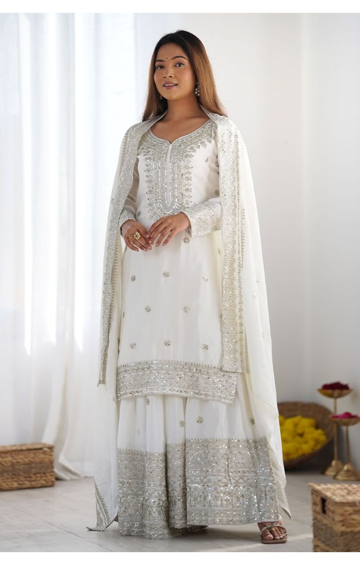 Royal White Chinon Silk Sharara Suit with mirror and sequin embroidery for weddings and festive occasions.