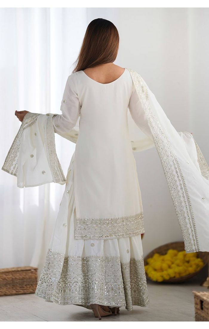 Royal White Chinon Silk Sharara Suit with mirror and sequin embroidery for weddings and festive occasions.