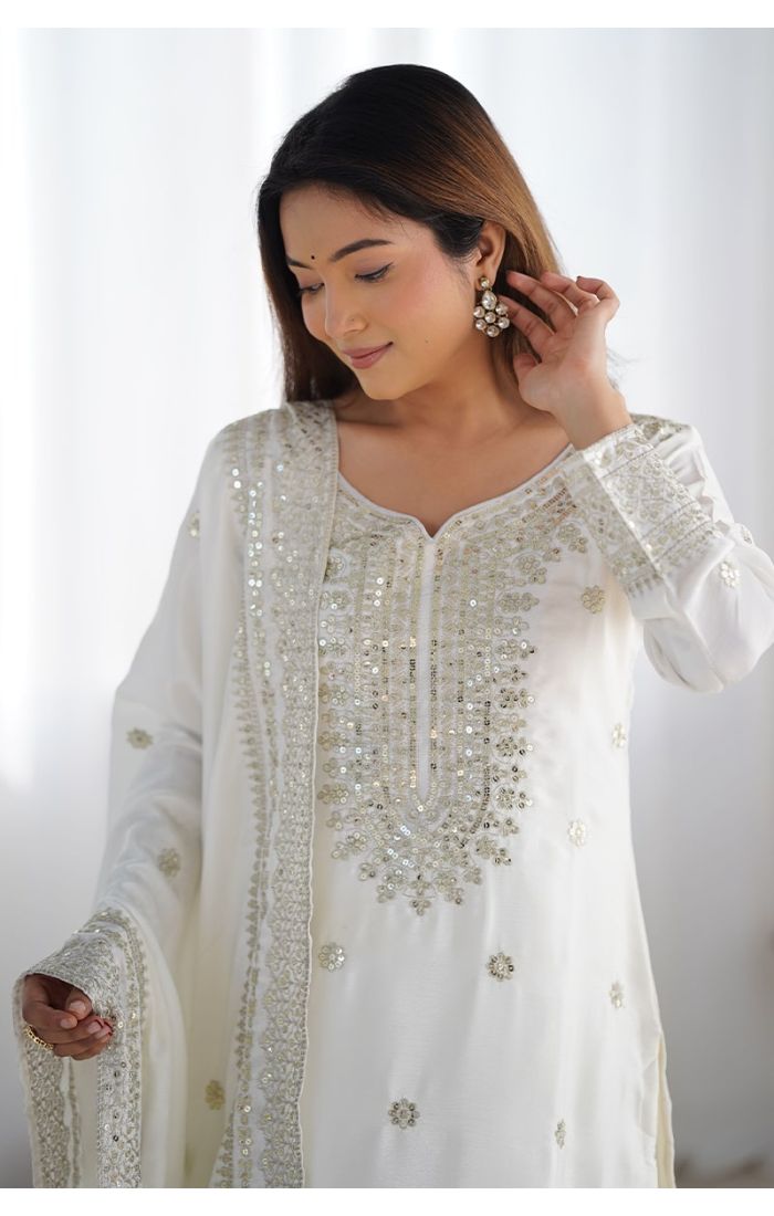 Royal White Chinon Silk Sharara Suit with mirror and sequin embroidery for weddings and festive occasions.