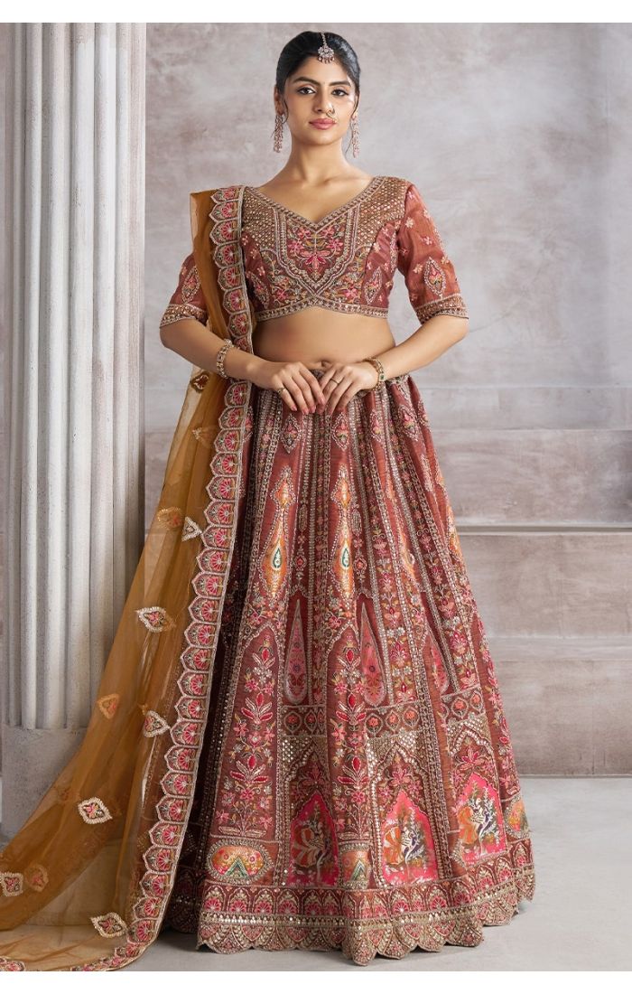 Mocha soft net lehenga choli front view with patchwork, aari embroidery and dupatta, ideal for weddings and sangeet