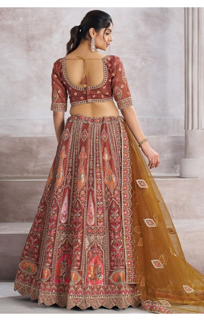 Back view of mocha color semi-stitched bridal lehenga choli with aari and patchwork on soft net fabric